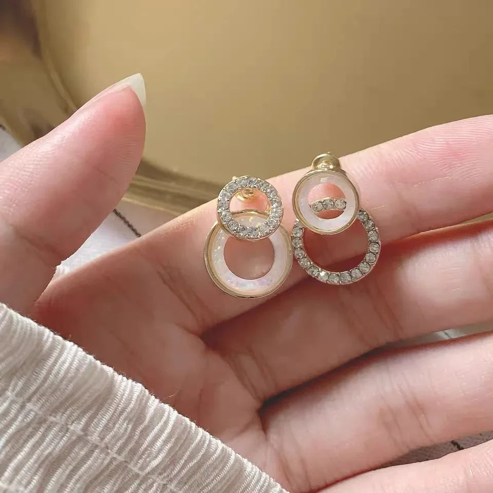 Terify®️Elegant Hollow Flowers Sun Alloy Drop Earrings for Women New Trendy ☀️